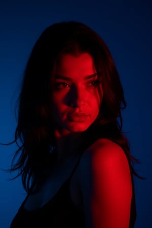 CridLight, 
A portrait of a woman, captured in a moody, low-key style. The subject is illuminated from the side, casting a vivid red glow on her face, which contrasts starkly against the deep blue background. Her dark hair flows freely, and she wears a sleeveless black top. The lighting emphasizes the contours of her face and the texture of her skin, creating a sense of depth and dimension. The overall color palette is dominated by cool tones, with the red glow adding a pop of warmth and vibrancy. The image exudes a mysterious and introspective aura, achieved through the subject's intense gaze and the play of light and shadow.