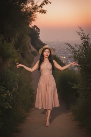 Vibrant hues dance across the canvas as a radiant young Korean woman stands confidently against a whimsical backdrop of soft feathers, bathed in the warm orange glow of dusk's mystical ambiance. Her graphic-print dress and matching hat make a bold statement as she outstretches her arms, embracing freedom with an introspective gaze upwards. The twinkling city lights behind her blur into the distant landscape, framed by lush foliage and the golden glow of sunset, with delicate shadows cast across her face.