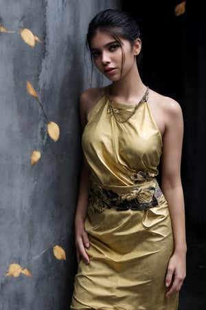 a mannequin stands against a white brick wall, adorned with a black dress adorned with gold embroidery. The dress is adorned with golden flowers and leaves, adding a touch of contrast to the black dress. The skirt is draped over the torso, revealing a black blouse. The blouse is adorned by a gold necklace and a gold embroidered necklace. The backdrop is a stark white, creating a stark contrast with the dress and rech background.