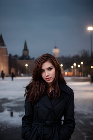 A woman with long red hair, wearing a fur coat, standing outdoors in snowy Red Square, Moscow, with iconic colorful domes in the background. She faces slightly sideways, looking directly at the camera with a calm expression.