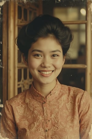 A faded old photo of a beautiful Malay woman with a classic 1960s hairstyle, black hair, and a warm smile, wearing an old-fashioned baju kurung kebaya. The shot is framed in a mid-close-up, capturing her elegant and traditional attire, with soft, warm lighting enhancing the vintage atmosphere. The composition highlights her hairstyle, smile, and intricate details of her baju kurung kebaya, creating a nostalgic and graceful scene. The photo's edges are slightly worn, adding to the antique charm.