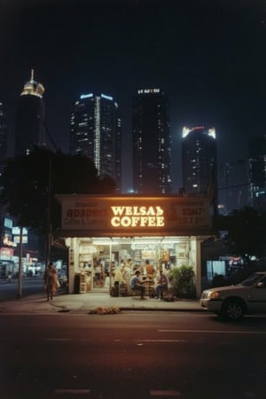 A 1990s nighttime view of a coffee shop in Kuala Lumpur, situated on a small road. The shop is brightly lit, with warm incandescent lighting casting a cozy glow. The scene is set against the backdrop of the bustling city, with distant skyscrapers and neon signs visible. The small road is dimly lit, with occasional cars passing by. The coffee shop's sign is illuminated, and a few patrons sit outside, enjoying their drinks. The atmosphere is a blend of urban energy and quiet charm, capturing the essence of 1990s Kuala Lumpur.