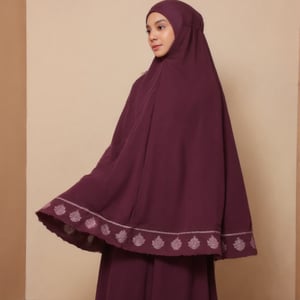 A model Salju1 gracefully wearing a beautiful deep topaz purple long telekung with intricate gold floral embroidery along the edges and around the hem, displaying traditional artistry with a modern touch. The fabric flows softly, with embroidery in lighter shades of purple and silver that add an exquisite contrast. The hood fits gently around the model’s face, highlighting her serene expression, while the long drape of the telekung falls elegantly to the floor. Set against in a mosque, neutral background to emphasize the rich purple hue and detailed craftsmanship, the telekung exudes sophistication and is perfect for special occasions or prayer. Perfect anatomy, perfect image, real alamy, Spontaneous, candid, natural 