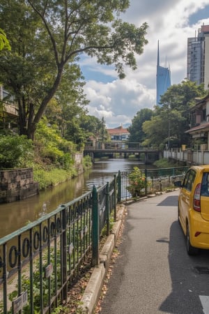 Panoramic shot of a serene urban oasis: a shallow river meanders through the cityscape, its crystal clear water reflecting lush greenery. A bright yellow MYVI 2016 car leisurely parked beside the river's edge, partially shaded by a sprawling tree branch. In the distance, an elevated MRT rail line arcs above MERDEKA tower, with trains gliding smoothly along tracks. Warm afternoon sunlight filters through greenery, casting dappled shadows across urban pavement. A ray of light pierces leaves, illuminating the street in soft glow. Lens flares dance around scene, refracting intense rays into vibrant hues.