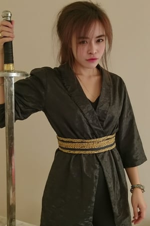 Beautiful girl in Japanese warrior costume Standing holding a large sword