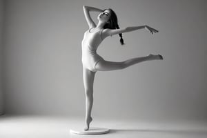 A serene, black-and-white photograph captures a mannequin girl striking a dynamic dancing pose. Framed against a pure white background, her stiff limbs seem to defy gravity as she twirls, one leg extended in mid-air. Soft, diffused lighting creates subtle shadows on her porcelain skin, while the camera's shallow depth of field emphasizes her frozen dance movement.