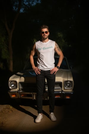 A man lit by flashlight posing confidently in a studio setting, wearing a sleeveless t-shirt that showcases intricate skin texture details and slim-fit long pants. He dons stylish sunglasses and strikes a pose beside a classic car, bathed in Rembrandt lighting. The soft focus of the portrait highlights his face, with a rim light accentuating his features. In the background, a shady pine tree stands tall amidst a dirt road, where sunlight casts warm spots on the dark terrain, surrounded by lush greenery and a serene garden atmosphere.,FLASH,SKIN