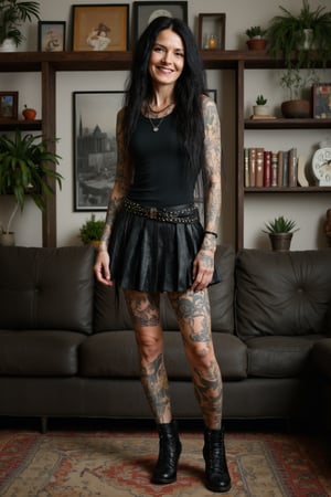 A full-body photo of a 40yo goth with very long hair.
She has a cute round face with freckles and smiles.
She is wearing a tight fitting sleeveless t-shirt made from smooth stretch fabric.
She is also wearing a short pleated skirt with a studded  belt and black leather ankle boots.
Her arms and legs are adorned with many colored tattoos of dragons and skulls.
She stands with a dynamic pose in an apartment with book shelves and plants on a rug. 