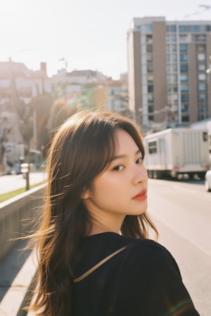 a woman, pretty, windy, in the street, Film Photography