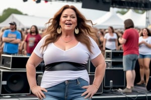 a plus size 50-year-old woman, Natural, curvy, tight (T-shirt), big chest, with long hair, at a music festival