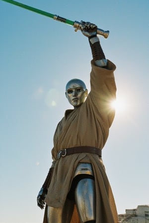 A robot stands heroically, clad in a worn Jedi robe and grasping a gleaming lightsaber. The midday sun casts a warm glow, illuminating the metallic sheen of its body as it holds the blade aloft, ready to defend against an incoming attack. Framed against a bright blue sky, the robot's pose exudes strength and determination.