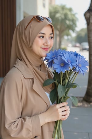 Candid moment on a sun-kissed sidewalk: a radiant adelliahalim wearing hijab in a trench coat and crisp white shirt holds and kisses a vibrant bouquet of blue flowers, her brown sunglasses tucked on her hijab head. Natural light dances across her features as she's lost in thought, the blurred background and bokeh effect creating a sense of intimacy. Soft lighting accentuates her bright smile, while super detailed textures bring the scene to life., Film Photography