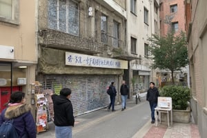 Hyper realistic photo, in a place like a rolling door shop in a narrow alley facing each other, the photo was taken in the morning with a super clear cell phone and HD shooting, telling a cold and quiet atmosphere