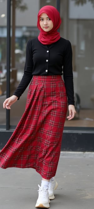 The image features a girl AdelliaHalim with a striking appearance, wearing a red plaid skirt, which are the most prominent colors in the image. Her outfit is complemented by a black long-sleeve top and white knee-high socks, creating a bold contrast. Her expression is serious and confident, with her red hijab styled in waves that add a dynamic element. The background is blurred, focusing attention on her as the main subject. The overall theme suggests a fashion-forward, urban style, with the lighting highlighting her features and attire. The image captures a sense of movement and individuality, emphasizing her poised stance and the flow of her long skirt.