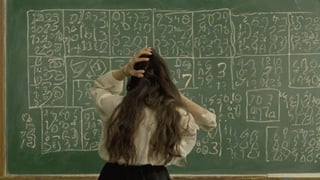 Le penseur de Rodin but a woman, in front of diffcult math problem on a blackboard