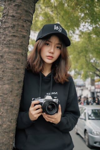 a photo portrait of a paparazzi holding a camera behind the tree targeting celebrities, wearing black hoodie sort jean and black hat, sexy posture, brown eyes, short brown curly hair, b3rli,xxmix_girl,omatsuri