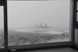 very wide shot,distant screen,eye-level,city outside the window,(( vague  white fogs)),front view,gray scale,perspective