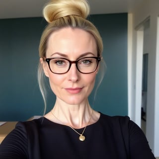 Create a selfie of a (((48-year-old European female teacher))) with pale skin, perfect shape body, small_breast, pendant_breasts and a sleek silhouette, inperfect skin. She has blonde hair with a messy bun, long oval face with warm and friendly look, small thin lips, light makeup, wearing ((glasses))