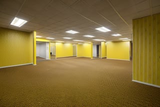 (masterpiece, best quality, 4k),(RAW photo, photorealistic),(hdr), vhs filter, level-0, Tutorial Level,fluorescent lighting on ceiling, patterned walls, long corridoors,(indoors),strange architecture,(yellow walls,carpeted floors,), volumetric lighting, backroom, liminal space