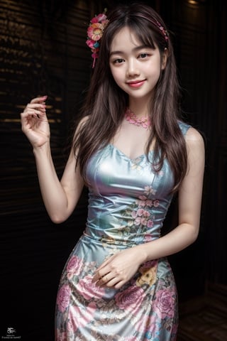 The image features a young woman with a radiant smile. She has long, dark hair and is wearing a sleeveless dress with a floral pattern. The dress is colorful, with hues of pink, blue, and green. She is also wearing a headband with a floral design. Her pose is relaxed, with one hand resting on her hip and the other gently touching her dress. The overall style of the image is vibrant and cheerful.
