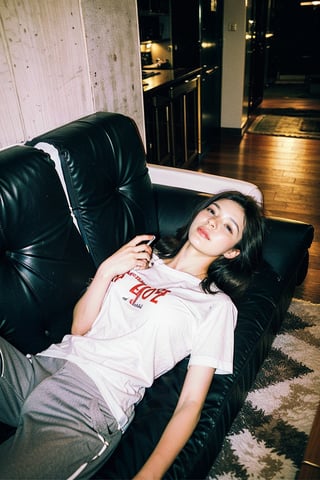 (intimate photo), photorealistic, 1girl, (busty) Korean girl, K-pop idol, 20 year old, young, solo, shirt, black hair, closed mouth, closed eyes, short sleeves, lying, pants, indoors, on back, phone, black pants, stuffed toy, table, sleeping, couch, grey shirt, realistic, on couch