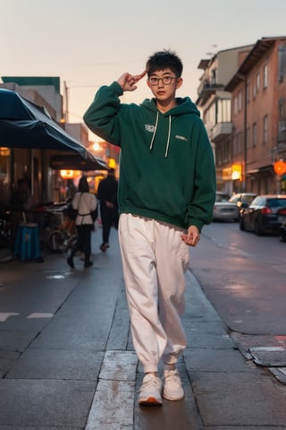 Make a photoshoot portrait of a young Chinese man, 18 years old, cool pose, blue hoodie urban, army green jogger pants, white shoes, glasses... sunset sky background, blur lens background, full body shot, legs, long shot,