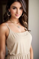 a beautiful woman with brown hair looks at the camera. Beige sleeveless dress, jewelry