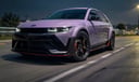 Ionic 5 N, 5N, car, sports car, UHD, 8K, UNREAL ENGINE, PHOTOREALISTIC, REALISTIC, passing scenery,5N, aerodynamic parts, customized, ((satin_matt_color)), ((purple_headlights)), dynamic color, (dark_purple_lights)), decorative LED Lights, dynamic lighting, dynamic_background,5N, fast driving in the winding road, blurred background, slick body,