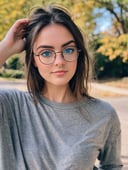 21 yo american instagram influencer, brunette, (wire rim glasses:1.4), [steel blue eyes], capture this image with a high resolution photograph using an 85mm lens for a flattering perspective
