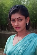 Malayalam movie actress unni mary:1.5,(((masterpiece))), (((best quality))), ((ultra-detailed)), (illustration), ((an extremely delicate and beautiful)),dynamic angle,floating, (beautiful detailed eyes), (detailed light) (1girl), loli, small_breasts, floating_hair,  glowing eyes, pointy_ears, white hair, green eyes,halter dress, feather, leaves, nature, (sunlight), river, (forest),(painting),(sketch),(bloom)
