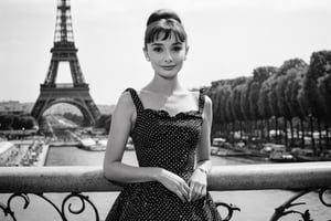 B & W Photo of a young 20yo Audrey Hepburn in a polkadot summer dress in Paris, Eiffel Tower in the background, Canon 5d Mark 4, Kodak Ektar