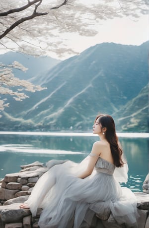 A Korean girl, wearing gray and white tulle, with a delicate face, real style, exquisite facial features, happy smile, sitting by the lake quietly enjoying life, the wind chimes in the wind are so light,
 You listen to the sound of the wind,
 I feel myself gradually rippling,
 It is more comfortable than fallen leaves and more tranquil than lake water.,better photography,xxmix_girl
