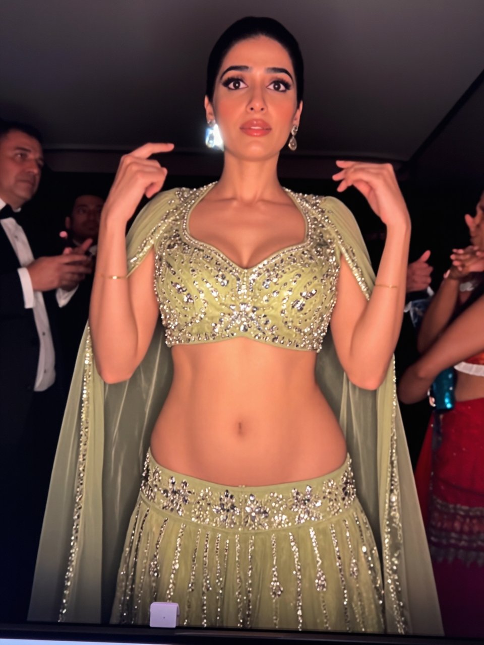 highly-detailed 4k hds candid amateur eye-level photo.A small peitite slim buxom woman is wearing a low_rise,  low-rise,...