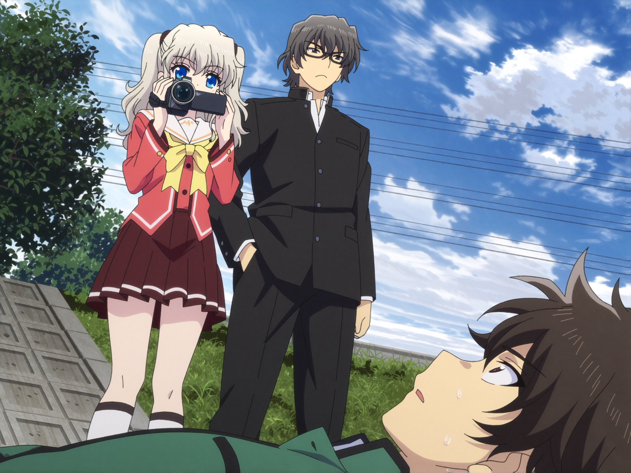 An outdoor daytime scene captured from a low upward angle beneath the subjects against a bright blue sky filled with fluff...