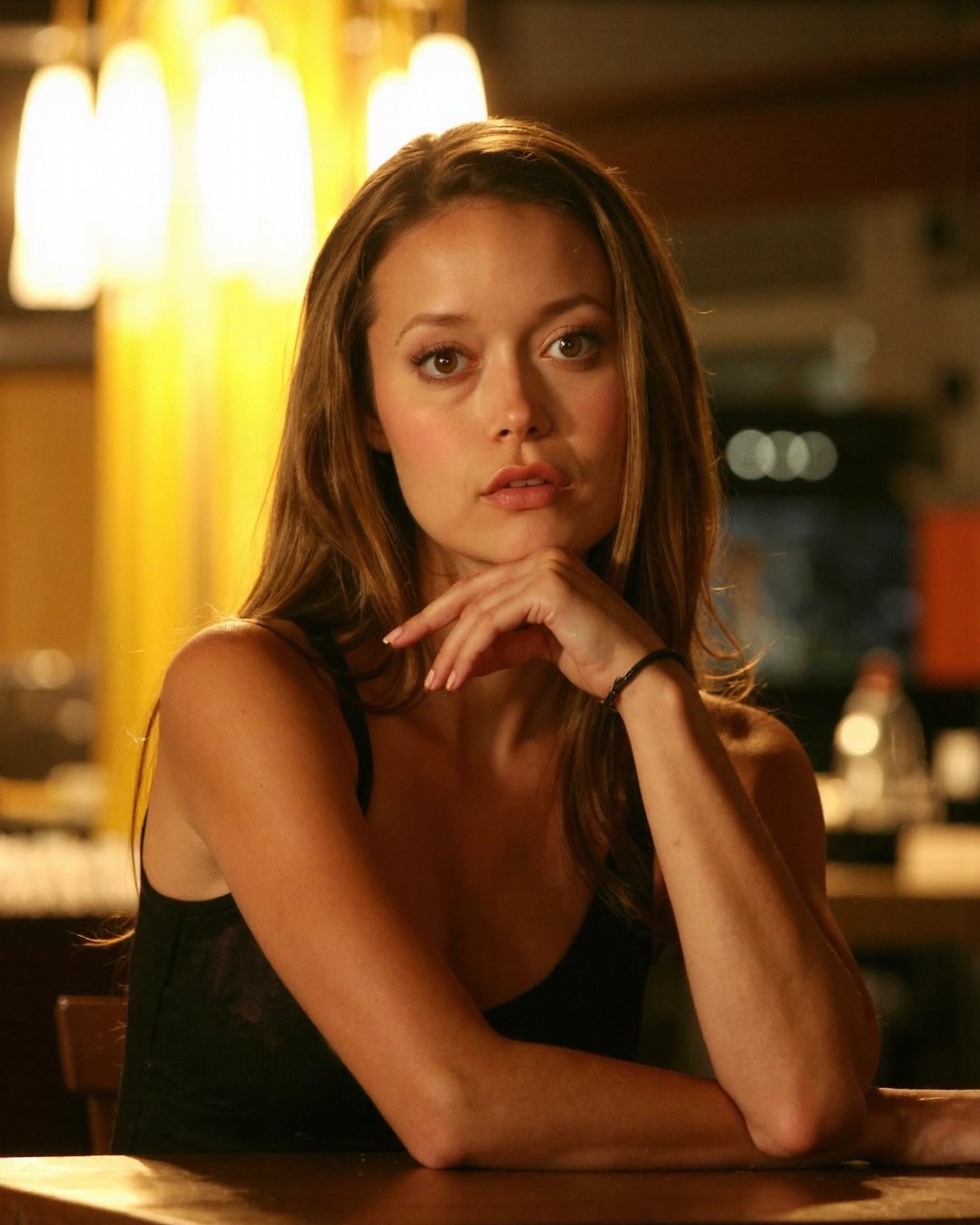a close-up,  intimate portrait of summer_glau with fair skin and striking brown eyes. She has a slender physique and smoot...