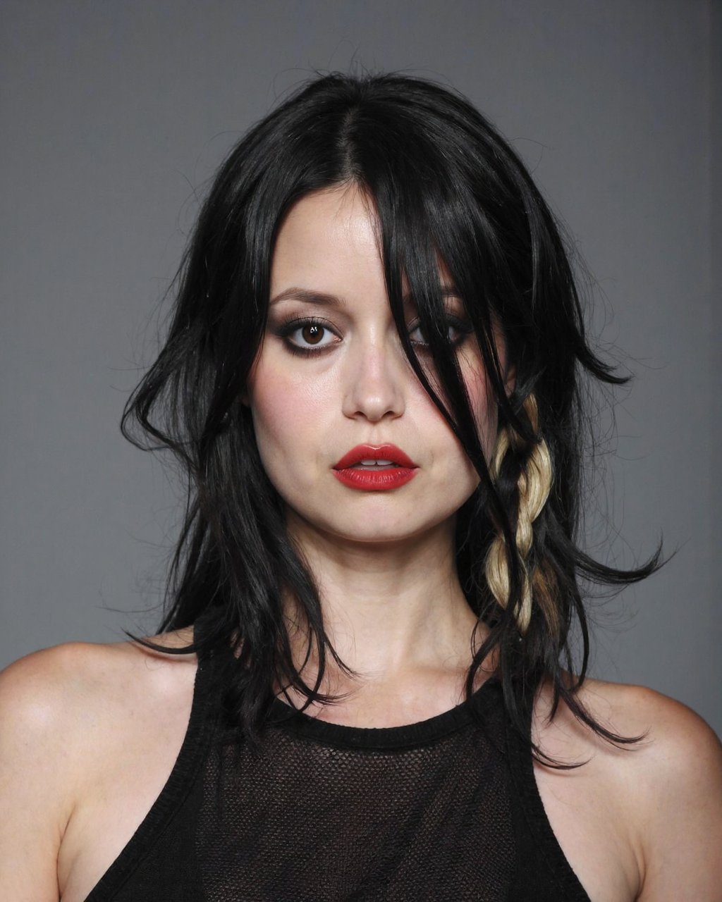 This is a high-resolution photograph of summer_glau with pitch black hair styled in a messy,  asymmetrical bob with platin...