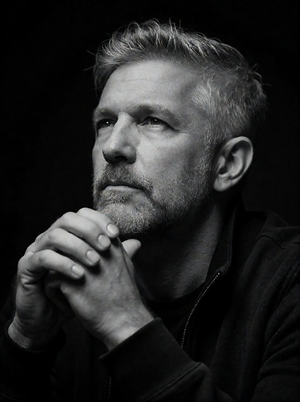 Bradhamel art style. A high-contrast black and white portrait of a middle-aged man with graying,  textured hair and a salt...