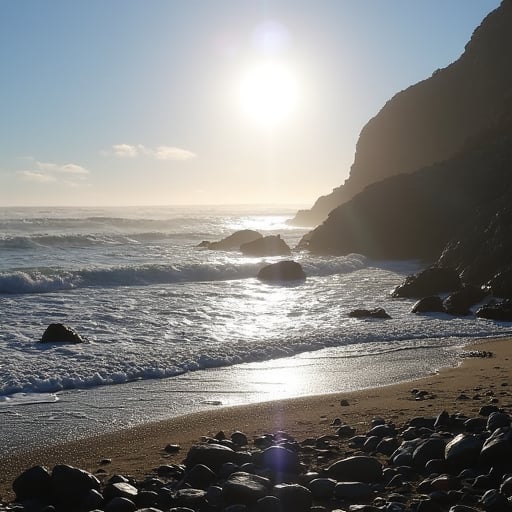 a rocky beach with waves crashing on it and the sun shining down on the water