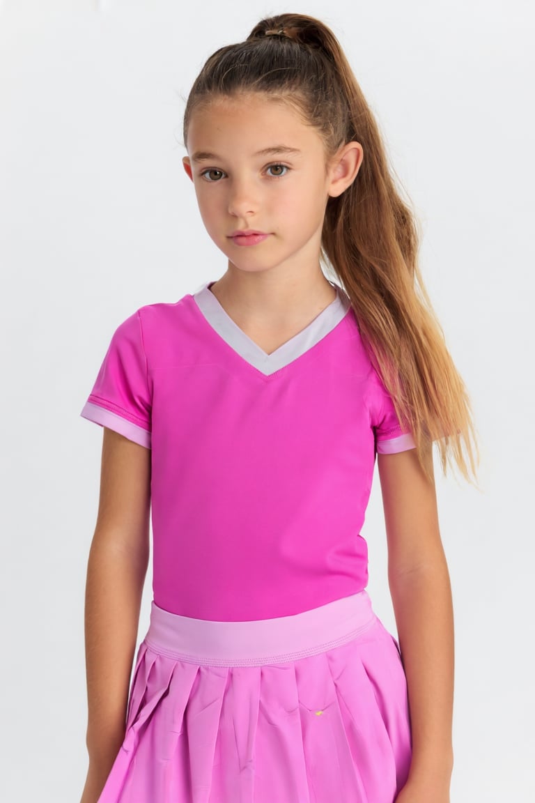 Portrait of a young girl,  PilettaDiva. She is wearing a pink tennis uniform,  her hair is in a ponytail. by turnbo on Ten...
