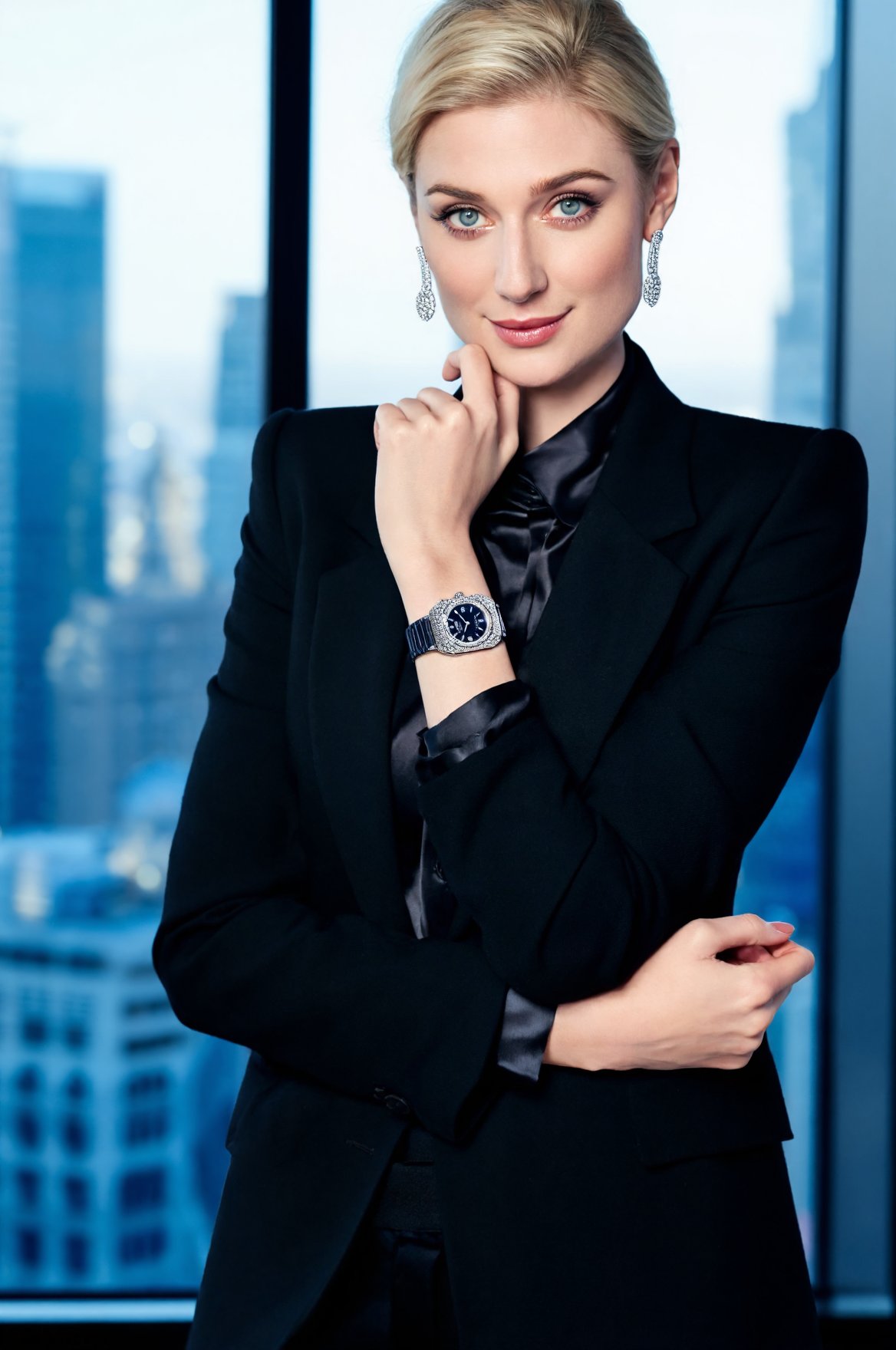 SUBJECT: wo3l1ck,  blonde woman,  elegant appearance CLOTHING: tailored black blazer over silk blouse ACCESSORIES: diamond...