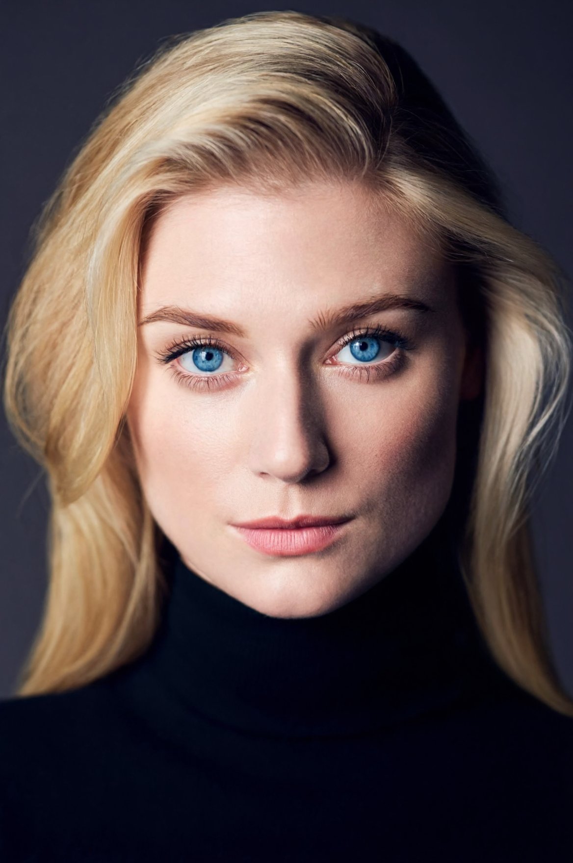 SUBJECT: wo3l1ck,  blonde woman,  striking blue eyes CLOTHING: black turtleneck ACCESSORIES: none POSE: close-up headshot...
