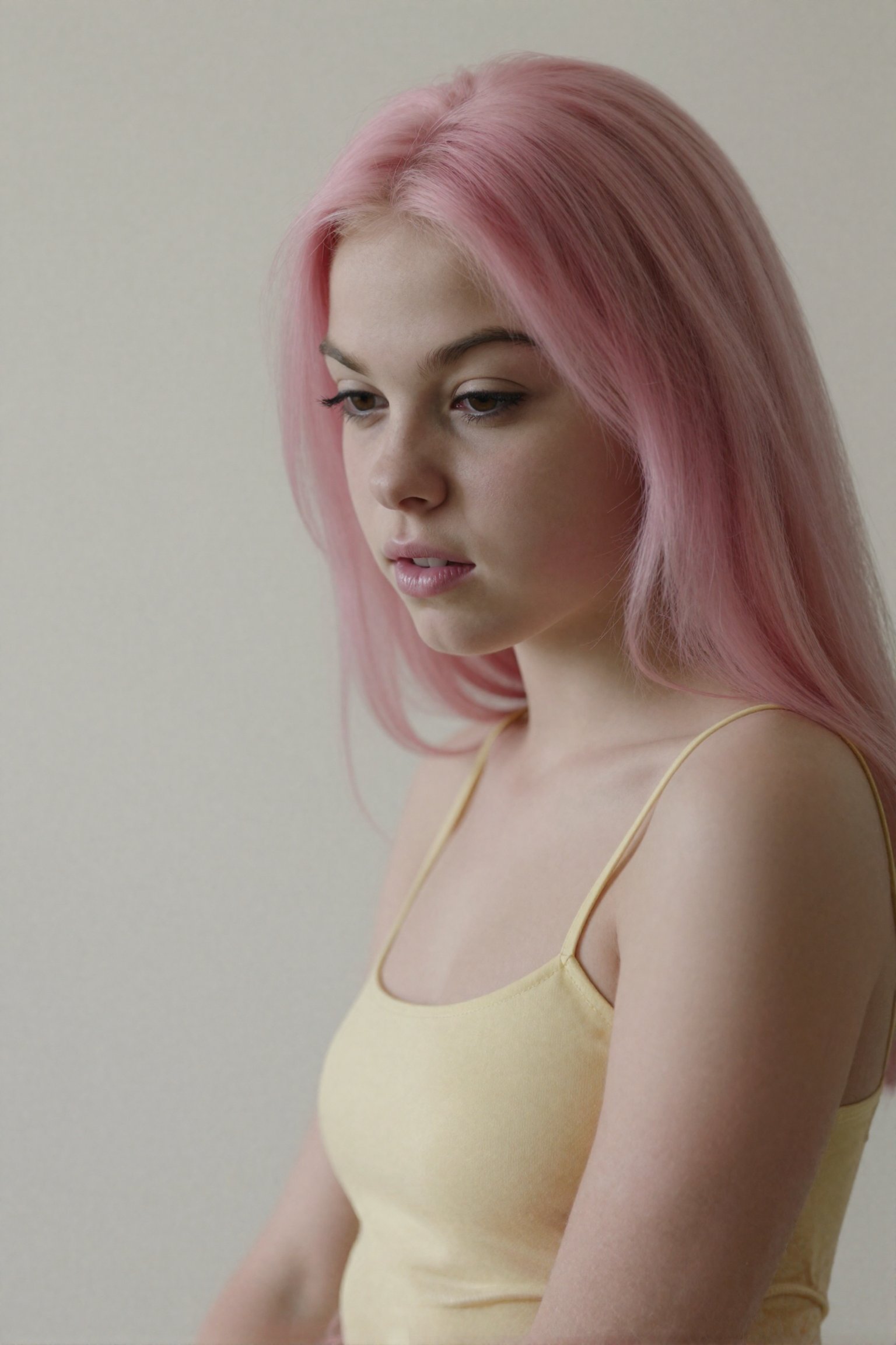 The image depicts a young teen with an unnervingly slender build and an elongated head-to-body ratio that accentuates her...