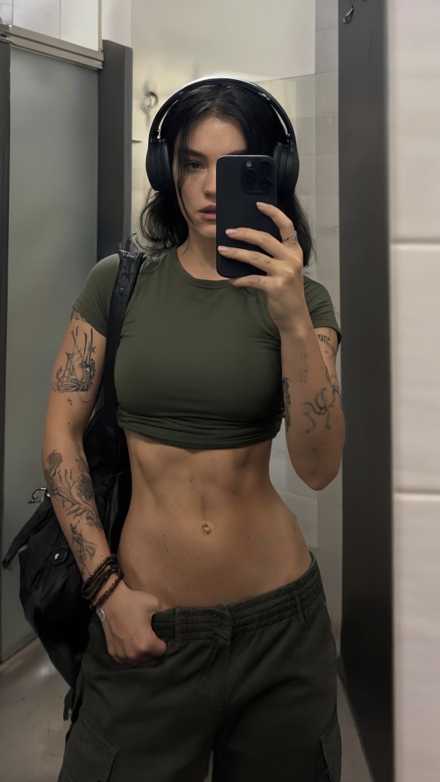 Highly detailed hyper-realistic mirror selfie of a fit young woman with dark hair,  large headphones,  and extensive arm t...