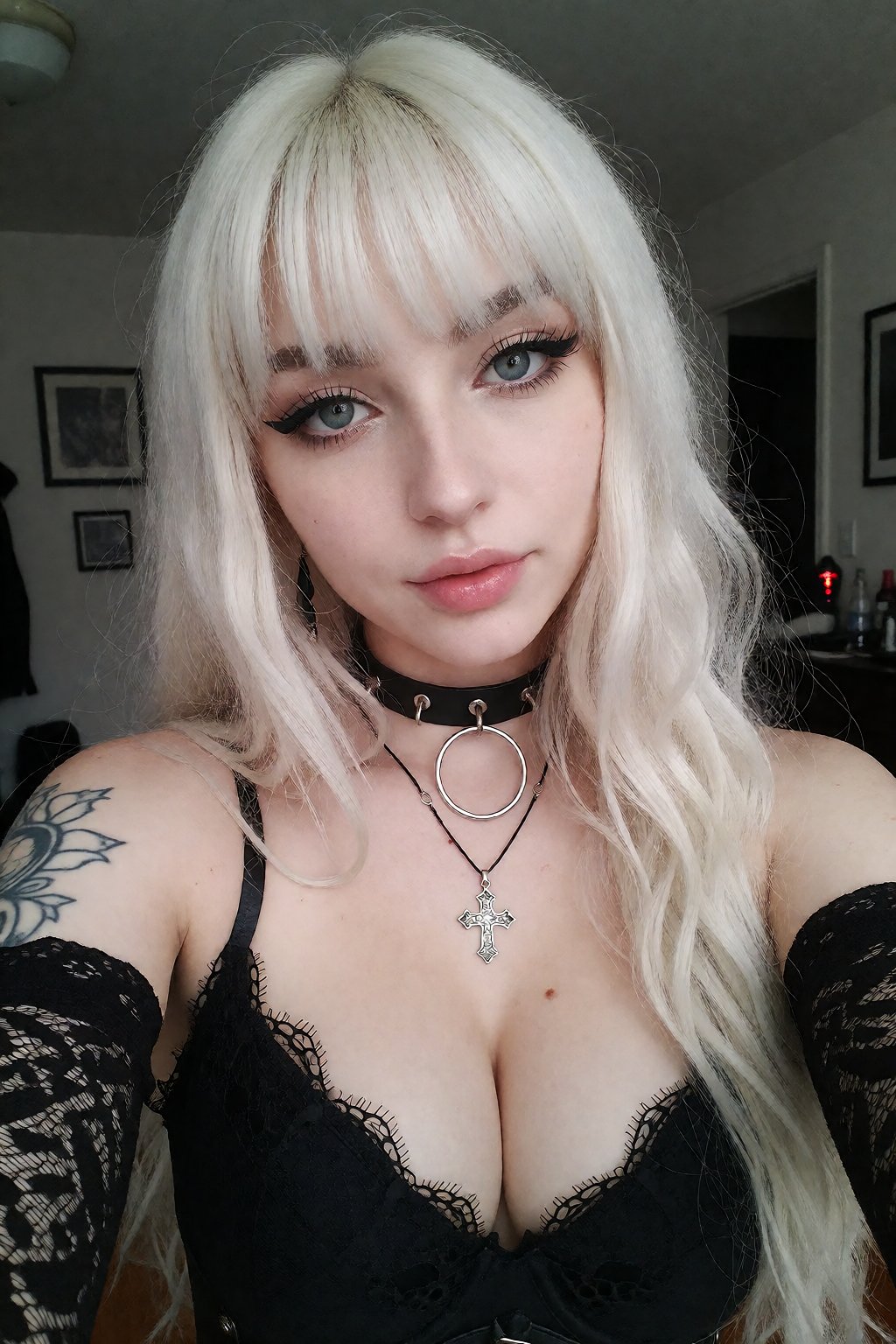 photo of a 30 years old beautiful goth female White Raven with platinum blonde hair,  bangs,  gorgeous face by NukeA.I on...