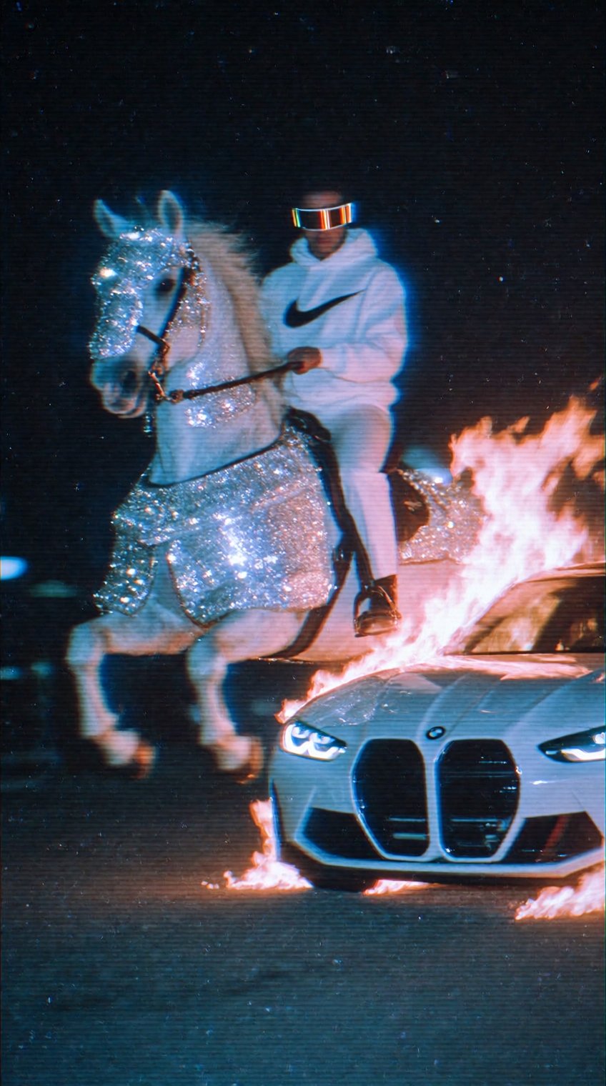 A low-fidelity,  analog-style night-time video screenshot with a strong cyber Y2K aesthetic. In the center,  a person wear...