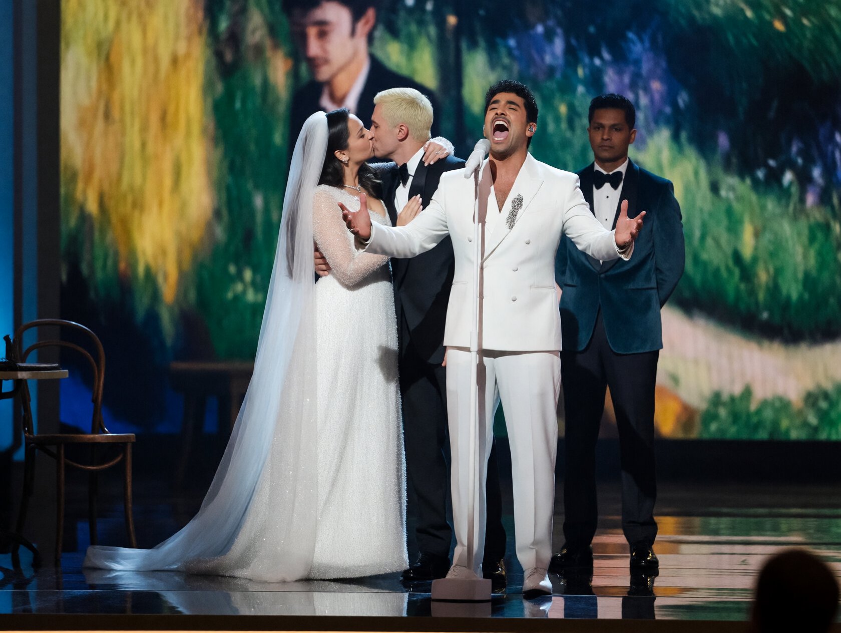 {"high_level_description":"Cinematic theatrical stage performance featuring a dramatic operatic singer in white,  flanked...
