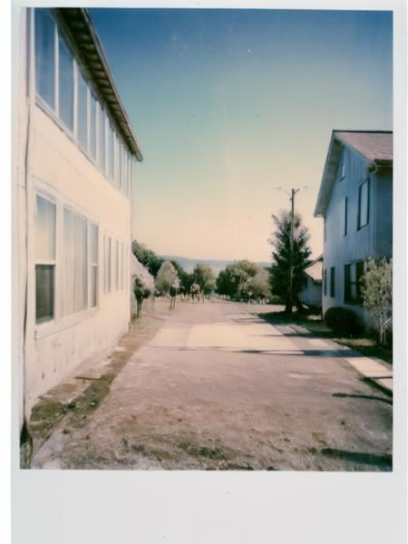 nkplr0, polaroid,  summer,  soft lighting, high quality, film grain, Fujifilm, <lora:NuclearPolaroid1:1.5> 