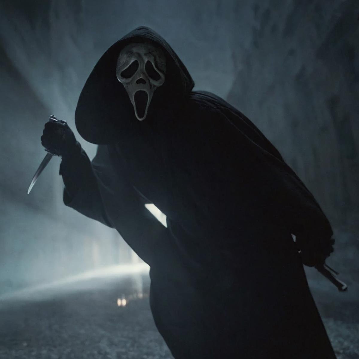 cinematic film still of Chiaroscuro Lighting Style Ghostface a person in a black robe and a skeleton mask,  scream horror...