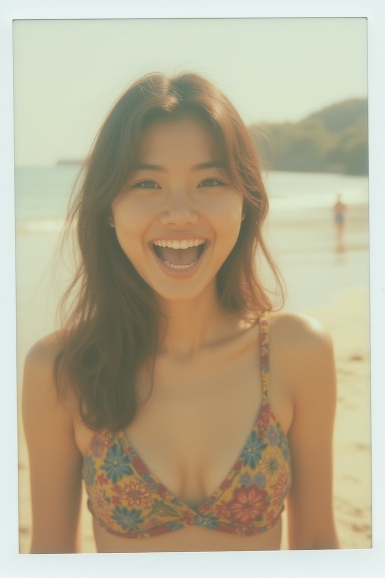 A Polaroid photo of a Korean woman with an excited expression, captured at the beach. The image features soft, natural lighting, focusing on her animated face and casual attire. The composition is candid, with the beach setting visible in the background.