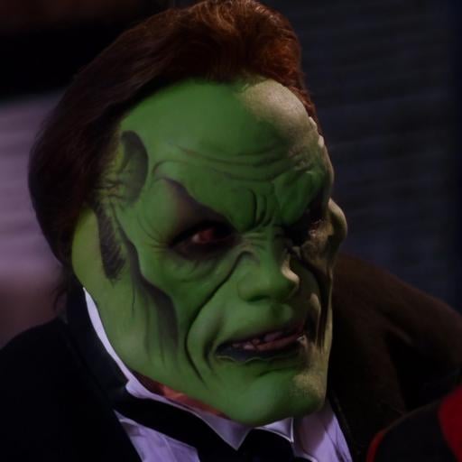 detailed high quality photo of a man with a (((green head))) and brown hair,  the_mask by BigHeadTF on Tensor.Art